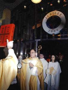 Bishop tobin incenses the front of St. Columba Cathedral.