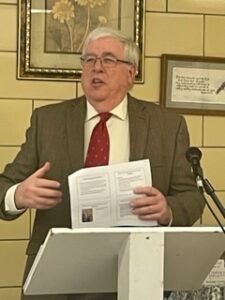 David Schmidt, director of pro-life, marriage and family life for the Diocese of Youngstown, explains the program Walking With Moms In Need program at the recent annual meeting of the Youngstown Diocese Council of Catholic Women.
