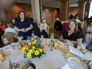 Photo of attendees before dinner.