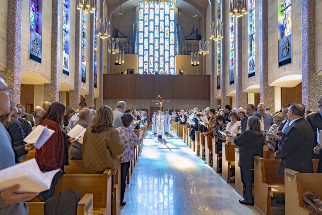 Servers walk in procession during the beginning of the 2024 Rite of Election. Photo by Brian Keith