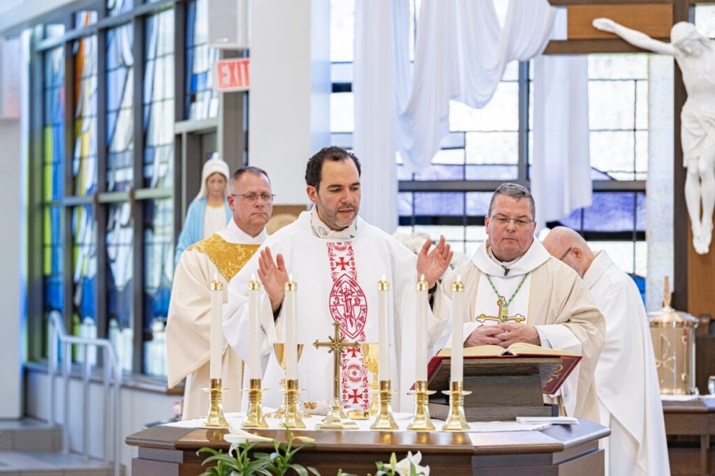 Father Cicero welcomes jubilarians to the Mass. Photo by Brian keith.