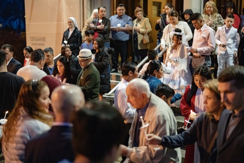 A large crowd gathers outside the church at the Easter Vigil 2024 at St. Dominic's. Photo by Brian Keith.
