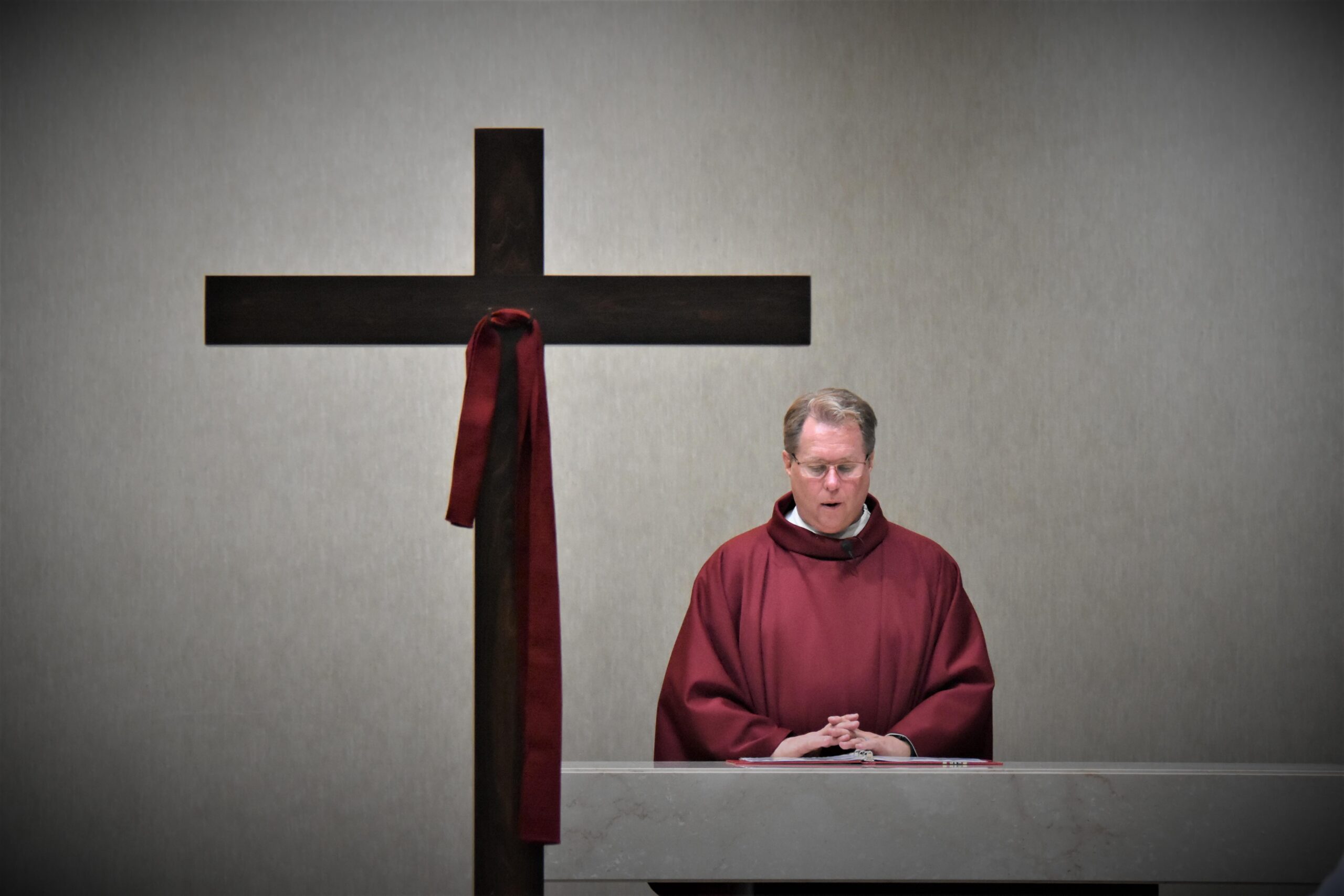 Good Friday at St. William Parish in Champion, 2023. Father Balash stands at the altar. Photo by Robert Zajack.