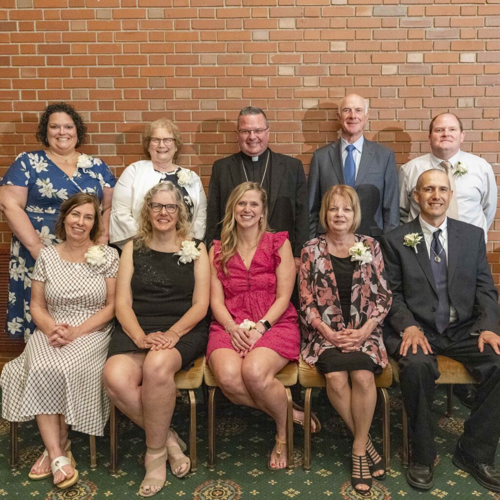 Award recipients pose with Bishop Bonnar