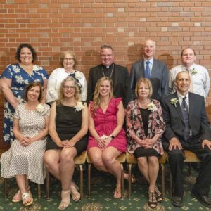 Award recipients pose with Bishop Bonnar