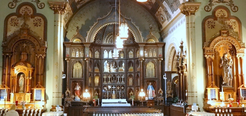 Image of the Altar at St. Anthony Chapel, displaying thousands of relics around it