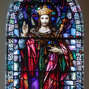 Stained glass window depicting Christ the King