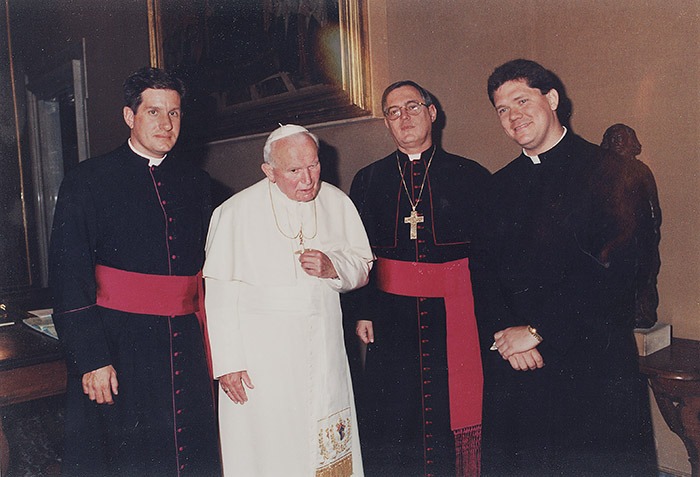 Bishop elect Keehner poses with Saint Pope John Paul II