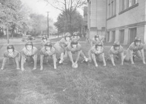 Archival photo of football players at St. Rose School in Girard during the 1940s.