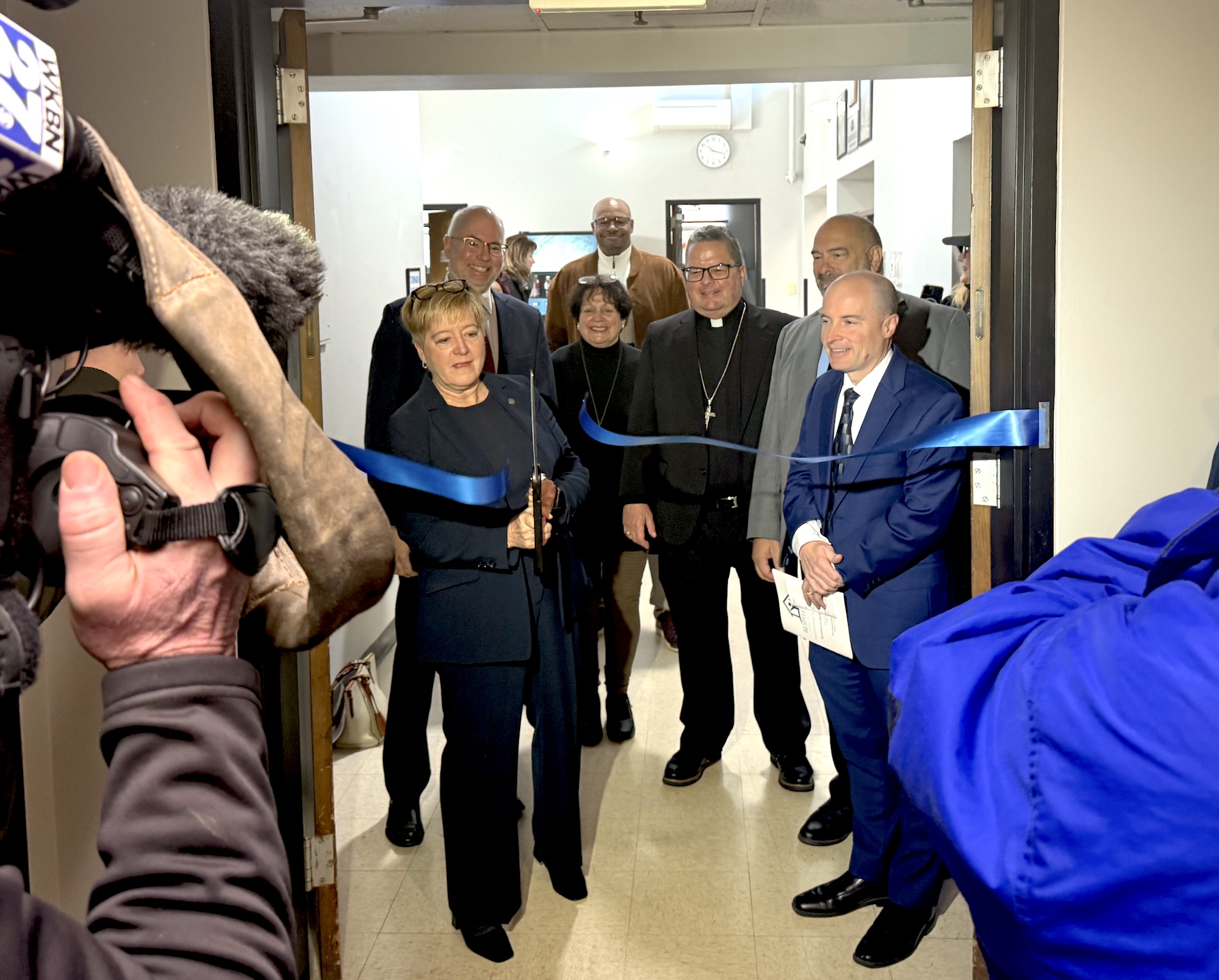 image of cameramen filming ribbon cutting at Respite of Hope