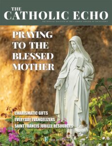 Cover featuring statue from Our Lady of Lourdes Grotto in Mogadore.
